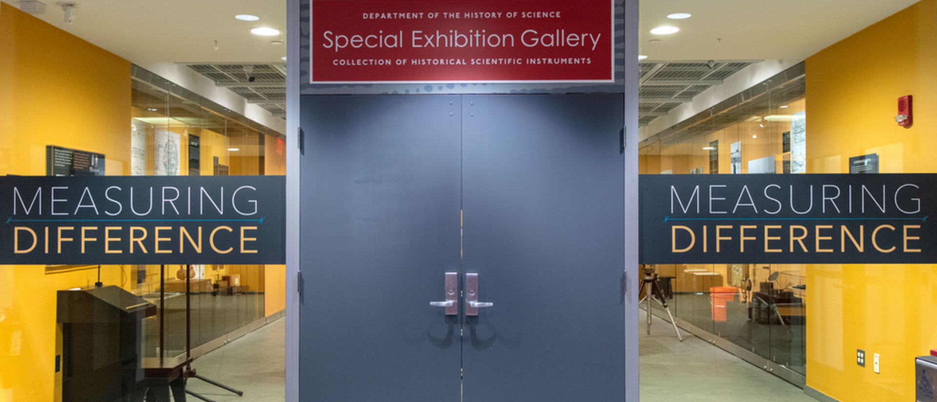 The entrance to the gallery space, saying "Measuring Difference"